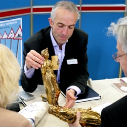Our general valuer appraises a 19th Century gilded bronze figure. Jonathan will conduct the initial  meeting with estate representatives and document the items to be valued.